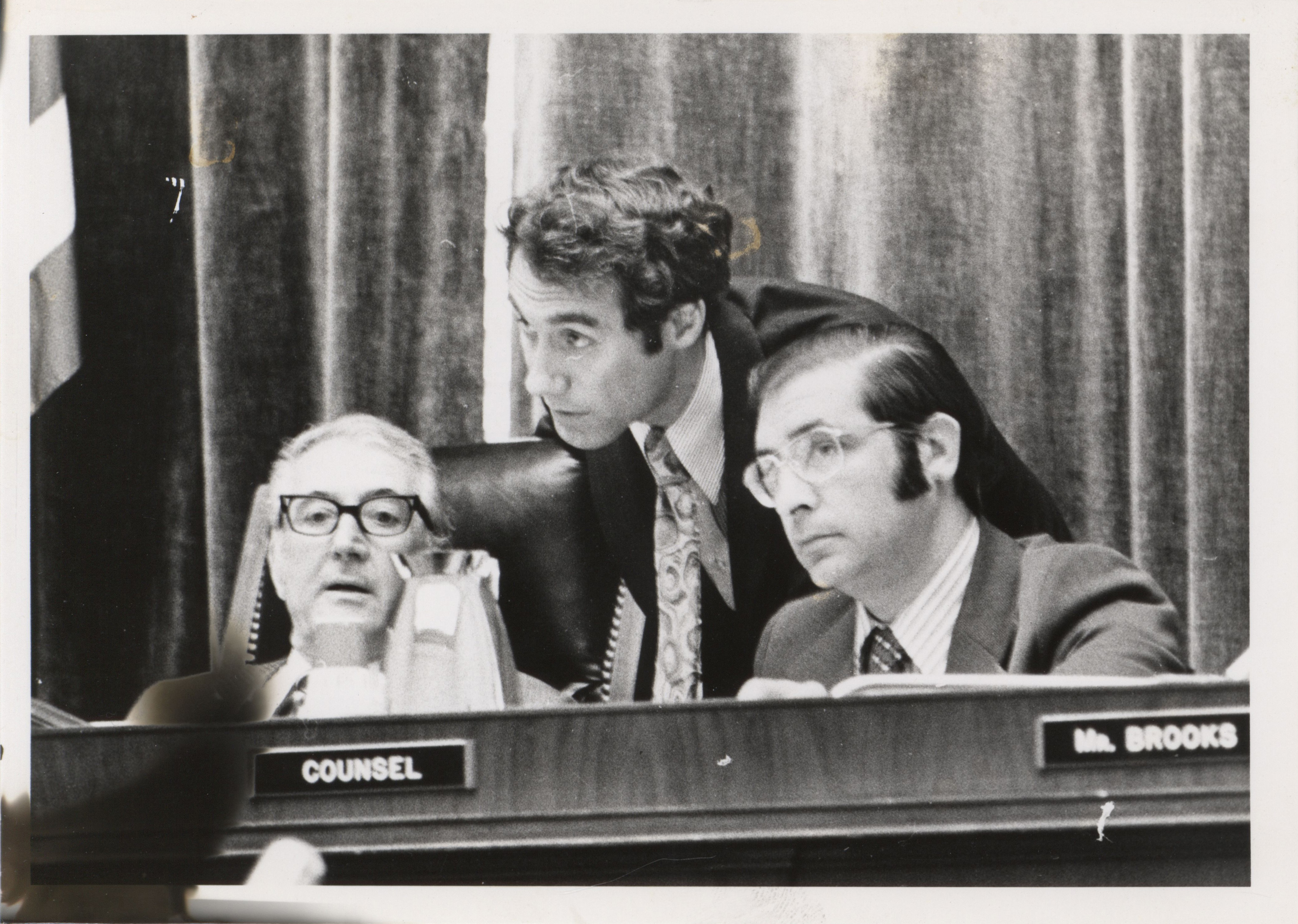 Ed Mezvinsky, center, conferring with other members of the House Judiciary Committee.